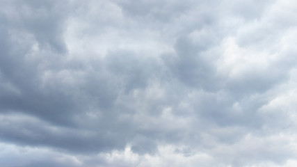 Obraz premium Gray rain clouds densely covered the sky, rainy weather. Workpiece for design