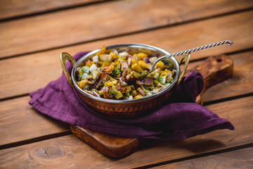 samosa chat masala spoon dish wooden board traditional indian cuisine