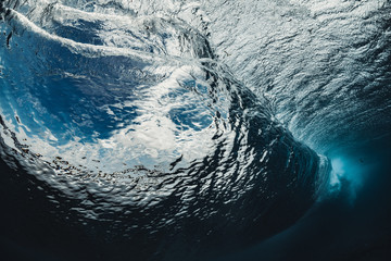 Incredible inside view of the wave. The perfect blue wave for surfing without people. one of the most beautiful waves on the planet. the wave is smooth as a mirror. fisheye photo from the water. - obrazy, fototapety, plakaty