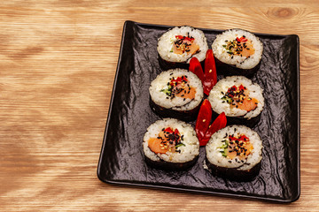 Korean roll Gimbap(kimbob). Steamed white rice (bap) and various other ingredients