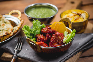 Traditional indian cuisine samosas  naan curry masala biryani rice kitchen towel panir tikka