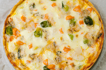 smoked salmon, Brussels sprouts and gorgonzola quiche tart, top view