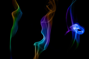 Obraz premium Abstract colored smoke on black background