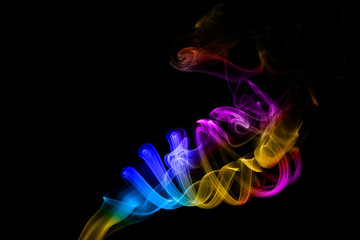 Obraz premium Abstract colored smoke on black background