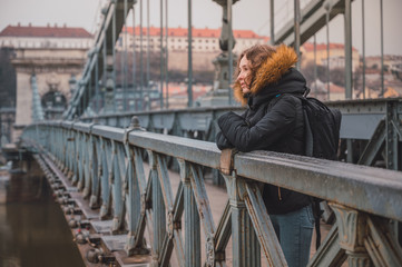 Young woman on the Chain Bridge in Budapest, Hungary