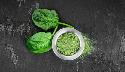 Homemade spinach powder (close up; selective focus)