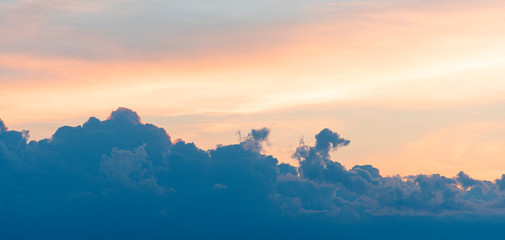 Sky during sunset with dark clouds, nature background, high resolution