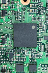 Printed circuit board (PCB) close-up shot with a lot of electronic components