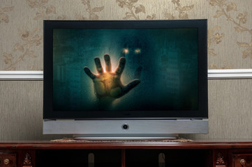 tv screen with horror show in the monitor. Media horror concept