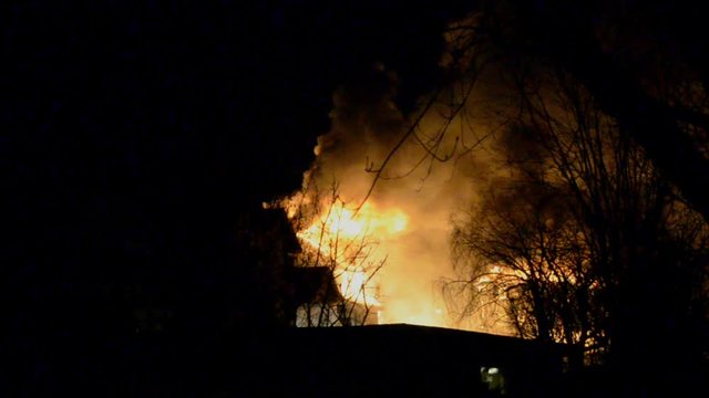 Big Fire of Two Houses Burning During the Night. Huge Flames.