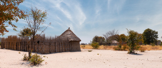 Traditional african village inside the Okavango Delta, Botswana - obrazy, fototapety, plakaty