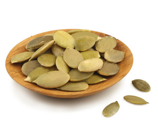 Pumpkin seeds isolated on white.