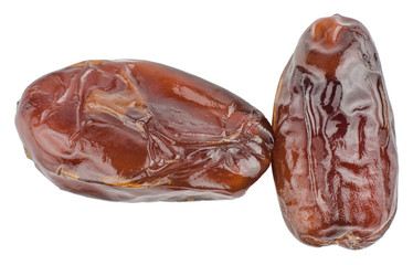 Dates on white background, top view, macro