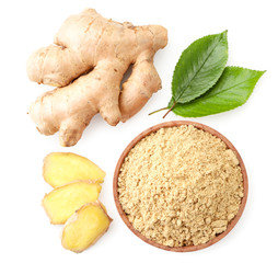 Ginger root, sliced and ground with green leaves on a white background. The view from top