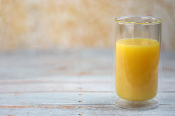 orange juice  on the table with copy space