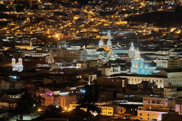 Fototapeta premium Night view of Quito, Ecuador, churches in the historic center