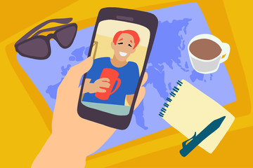 Hand with cellphone and world map and sunglasses on background.