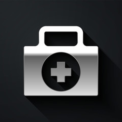 Obraz premium Silver First aid kit icon isolated on black background. Medical box with cross. Medical equipment for emergency. Healthcare concept. Long shadow style. Vector Illustration