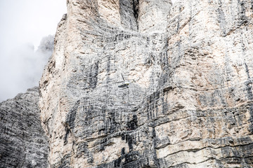 helicopter in front of rocks