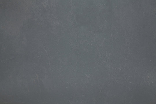 Metallic wall background, texture. Grey or dark-gray smooth painted surface. The wall and fence sketches. Dark, dingy and gloomy colors