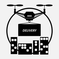 Concept for delivery service. Delivery drone with the package. Quadcopter transportation of goods.
