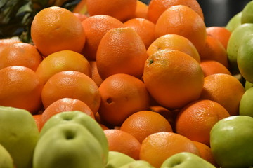 Close up Oranges on sale in the market.Orange wallpaper