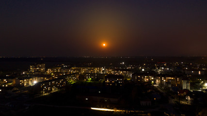 Fototapeta premium moonlight over night city