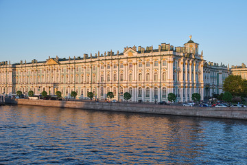 The winter Palace and pier on the Palace embankment clear day in summer in Saint-Petersburg