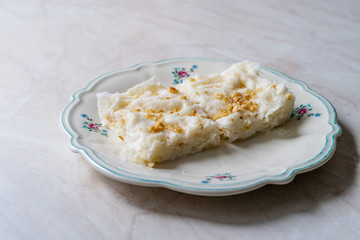 Traditional Turkish Ramadan Dessert Gullac . It is made with gullac (rice wafer or rice paper sheets) , milk, rose water, walnut, vanilla.
