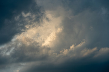 Naklejka na ściany i meble gray clouds. The sky before the rain and thunder. blue sky over gray clouds