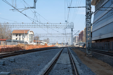 Fototapeta na wymiar View on the tracks 1, 2B and 2 of the reconstructed station Reutovo of Moscow Railway, Reutov, Moscow region, Russian Federation, March 28, 2020