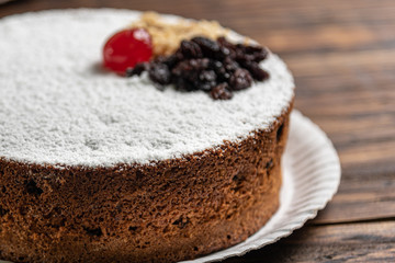 Tasty cake on  wooden background