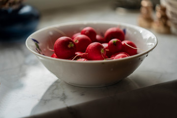 radish in a white plate.