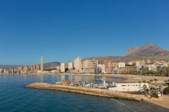 Benidorm Cala del mal pas beach and the boat jetty from the viewpoint in old town Costa Blanca Spain