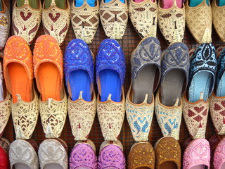 Khussa colorful shoes at cultural place Old Souk, Dubai, UAE.