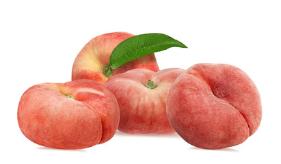 Three chinese flat donut peaches with leaf isolated on white with clipping path