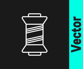 White line Sewing thread on spool icon isolated on black background. Yarn spool. Thread bobbin. Vector Illustration