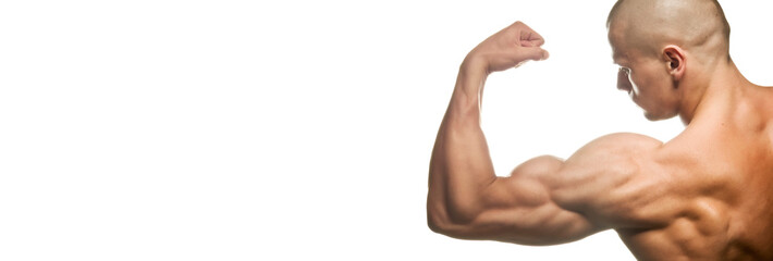Close-up of a power fitness man's hand. Muscular bodybuilder flexing and showing his biceps - external side - on white background. Studio shot - obrazy, fototapety, plakaty