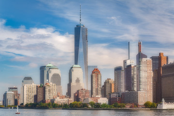 Fototapeta na wymiar View of New York City lower Manhattan skyline from the tourist ferry, Usa.