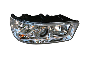 Car front headlight on an isolated white background. Spare parts.