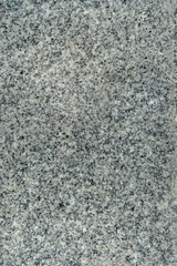 Natural dark grey polished stone tile surface for background