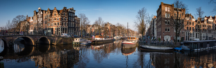 Fototapeta na wymiar Amsterdam, Netherlands - February 2016: Crooked buildings, a feature on the Prinsengeracht