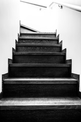 Wooden stairs in the house. Monochrome stairs up. Wooden interior elements.