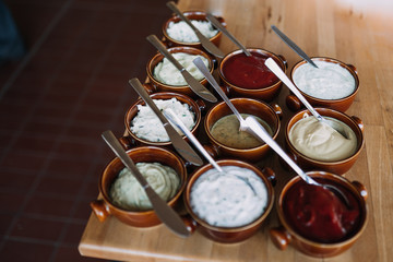 photo of souses bowls in an open buffet