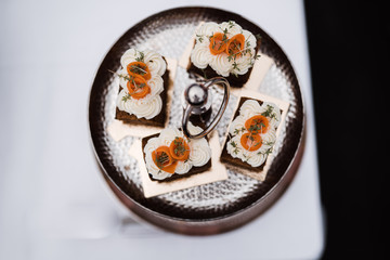 photo of carrot cake with carrots flowers on top