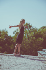 girl with long blond hair back view