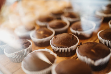 photo of fresh chocolate cup cakes inside of the oven