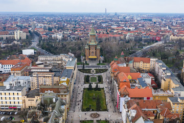 Beautiful cloudy sunset over Union Square - Piata Unirii Timisoara. Aerial view from Timisoara taken by a professional drone