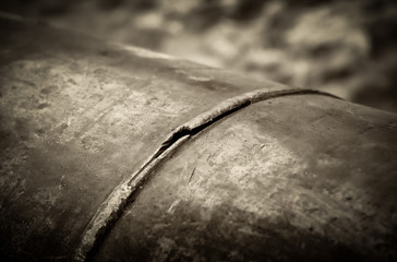 A fragment of the main pipeline for pumping gas. In the frame, the weld defect is a hole and a...