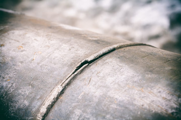 A fragment of the main pipeline for pumping gas. In the frame, the weld defect is a hole and a...